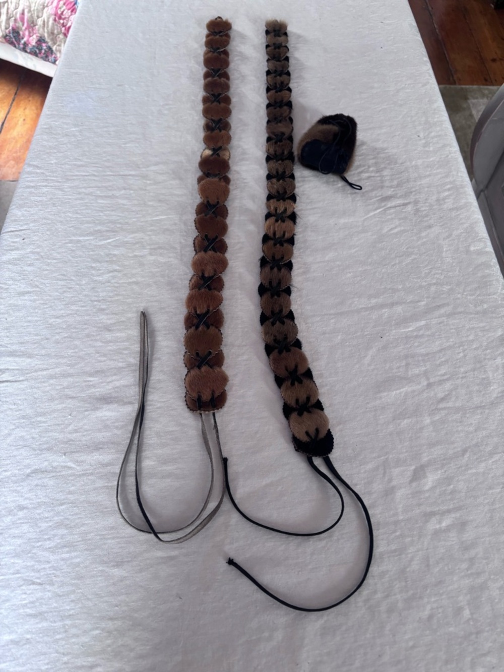 Two Seal Skin Belts and Sealskin Tie Pouch